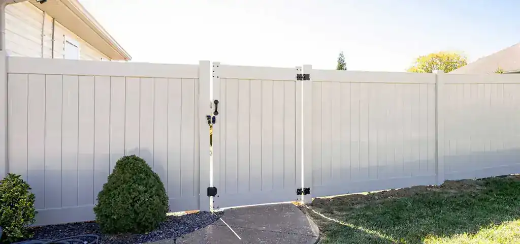 White vinyl privacy fencing installed by Aaron Fence